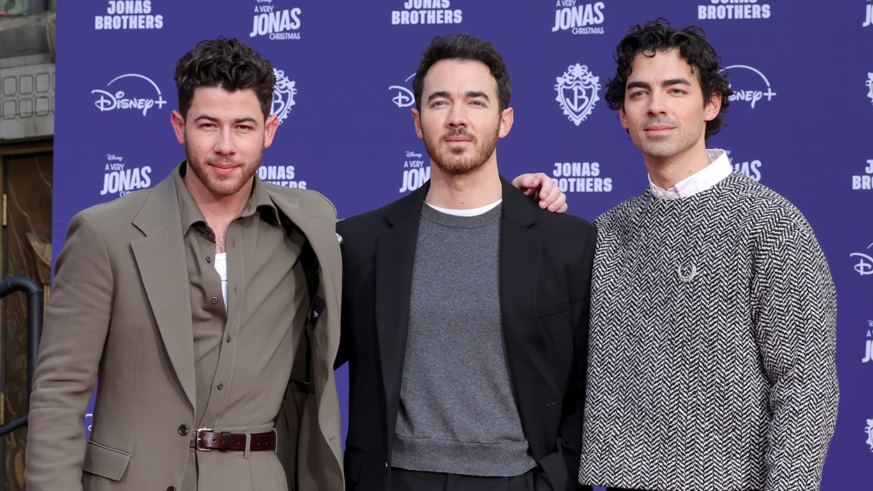 HOLLYWOOD, CALIFORNIA - DECEMBER 03: (L-R ) Nick Jonas, Kevin Jonas and Joe Jonas attend the Jonas Brothers Hand and Footprint in Cement Ceremony at TCL Chinese Theatre on December 03, 2025 in Hollywood, California. (Photo by Kevin Winter/Getty Images)